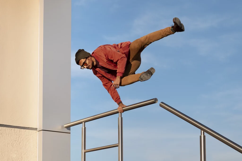 man jumping while doing parkour